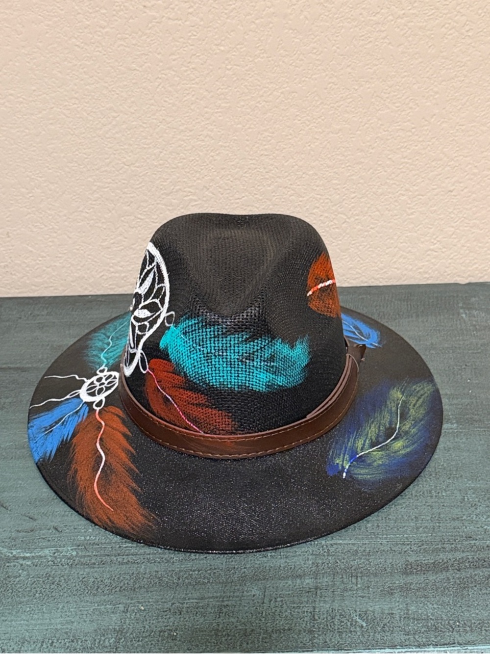 Mexican Black painted Hat with Multicolor Feather Design.